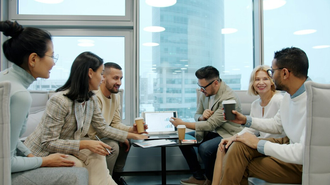 team discussing insurance strategy