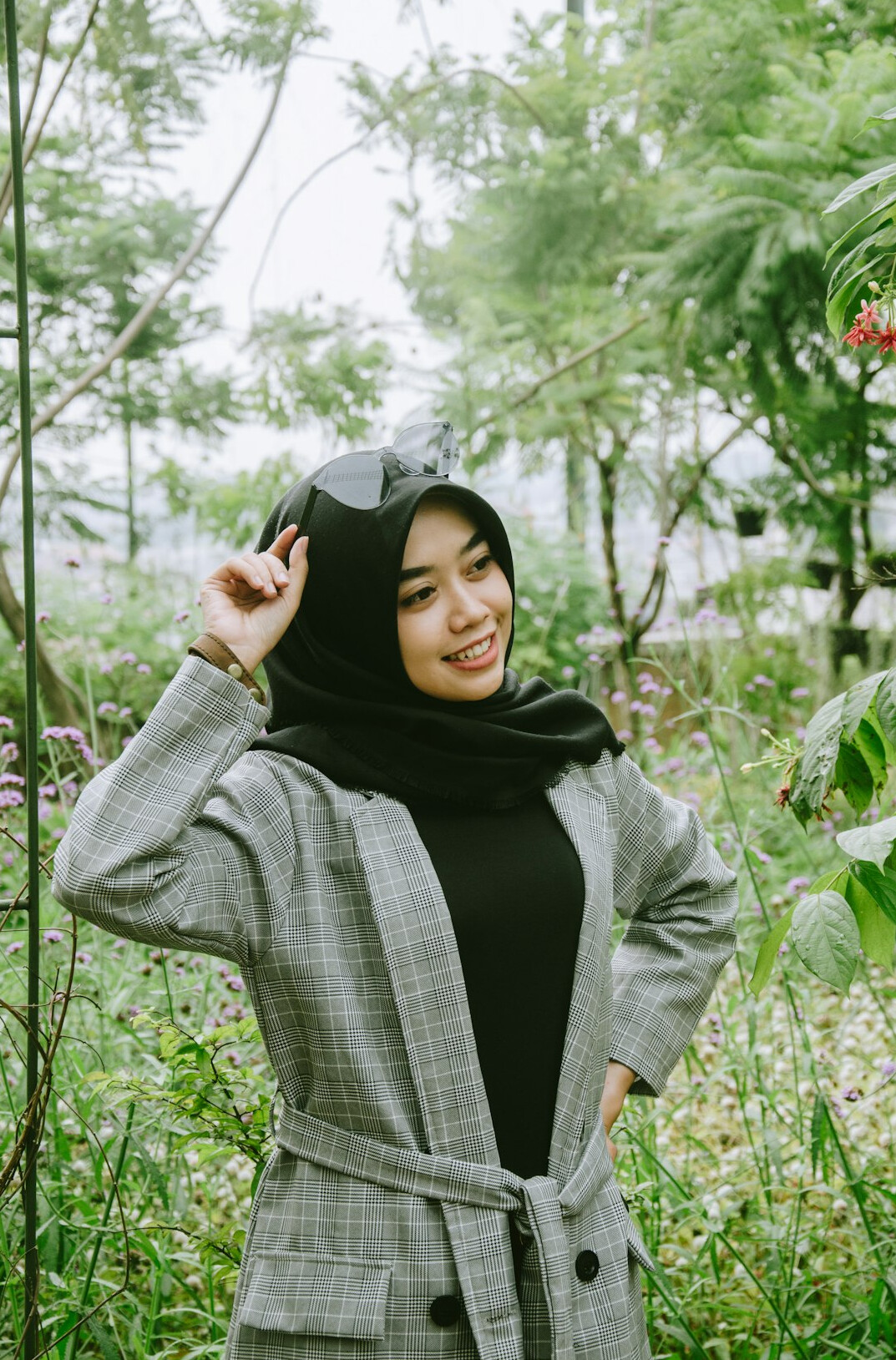Portrait of a smiling Malaysian professional in business casual attire